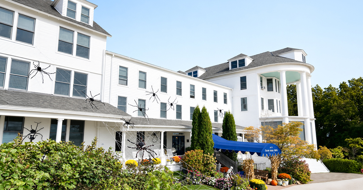 Island House Hotel decorated with spider and pumpkins for Halloween.