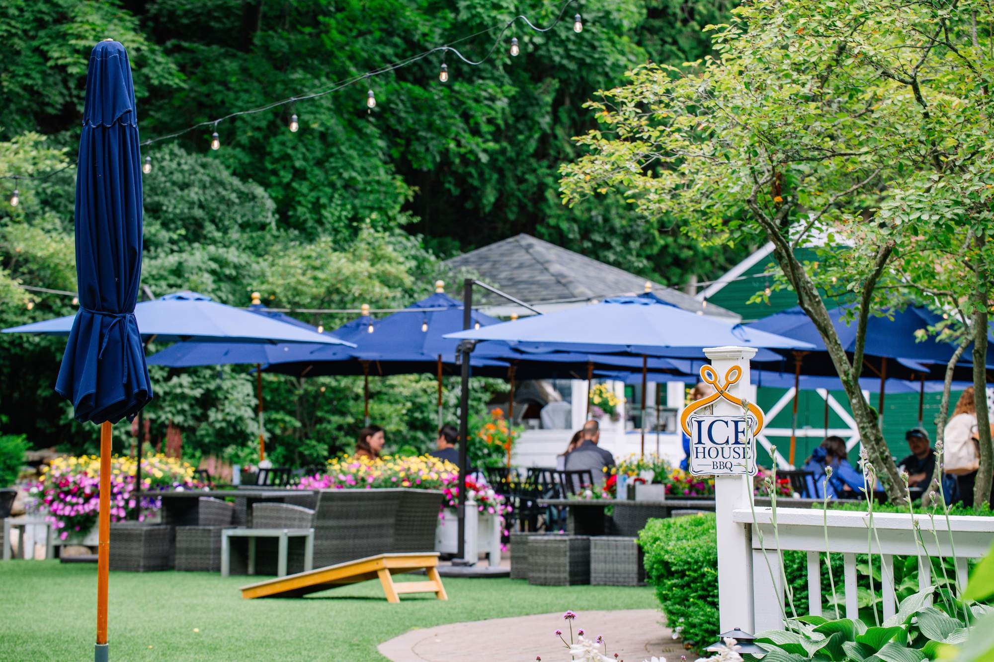 Ice House BBQ is located behind Island House Hotel on Mackinac Island with yard games and outdoor seating.
